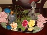 Vintage porcelain flowers, atomizer, perfume bottle and mirrored tray