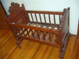 RARE 19TH CENTURY VICTORIAN RENAISSANCE CARVED WALNUT BABY CRIB WITH PATENTED ROCKING LEVER