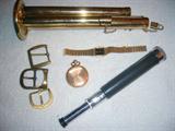 COIN BANK, WRIST WATCH, BELT BUCKLES, LOOKING SCOPE & ANTIQUE POCKET WATCH.