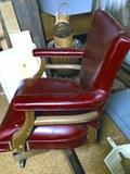 We have 2 of these great vintage leather chairs, one on wheels.