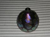 Very high-end irridescent art glass, (one of many.)