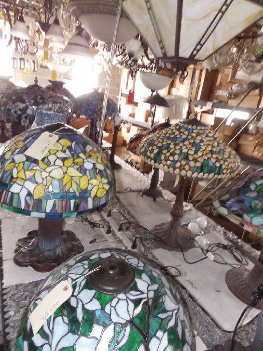 sconce crystal chandelier , ceiling fan ceiling lights , bathroom lights , tiffany style lamps , gold , silver , coins , records , stained glass , leaded glass , diamonds , treasure , cash , 