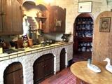 Storybook kitchen full of antique kitchenware