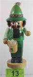 Lot#:	13
Description:	Vintage Steinbach Bavarian Beer Drinker Nutcracker
This wonderfully handcrafted wooden nutcracker from Steinbach Pralent would make a fantastic addition to any Christmas or holiday collection! Marked on bottom "Original Steinbach - Volkskunst - Germany". This festive nutcracker is handsomely painted in traditional Bavarian style clothing and hat and holds a beer stein in his right hand. Appears to be in excellent condition. Nutcracker history: "Due to the decline of the once flourishing mining industry in the 17th century miners were forced to look for a new basis of existence. The idea suggested itself to use the wealth of the huge forests of the Erzgebirge as a raw material source and to turn the carving and wood turning, which had before been pursued as a sideline, into the mains source of income."
Tag Words: Sculpture, Art, Statue, Decoration, Toy Soldier
Measures: 12" tall.
See more nutcrackers in this auction in lot #s 13, 118, 212, 296 and 386.
