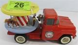 Lot#:	26
Description:	Vintage Buddy L Merry Go Round Toy Truck
A very well preserved Buddy L flat bed truck hauling a carousel / merry-go-round. The pressed steel toy appears all factory original, not restored, with the original decals / labels. Very nice paint, tires and accessories. Paint shows minor handling with some chips but no dents. Measures about 13" long.