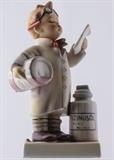 Lot#:	359
Description:	Hummel #322 Little Pharmacist Goebel TM4
An adorable porcelain figurine featuring a youngster dressed in a white lab coat. There is a bottle of "Rizinusol" at his feet and a bottle under his right arm which is dripping liquid behind him. The bottom of the base has a blue stamp with the Goebel trademark 4. Incised on the rim of the base is "M. I. Hummel". Master Sculptor was Karl Wagner. Figurine measures 5.75" tall. Free of chips, cracks, repairs. Some crazing is visible on the bottom.
Berta Hummel’s nickname was the “Hummelchen” (little bumble-bee). In 1934 she entered the Franciscan Abbey as Sister M. Innocentia. Her drawings depict kids just as they run about their native Bavarian village streets. Her sketch art caught the eye of Franz Goebel, porcelain maker and head of W. Goebel Porzellanfabrik, Germany. Goebel acquired rights to turn Hummel's drawing into figurines, producing the first line in 1935. These lovable street urchins never lose their youth and ar