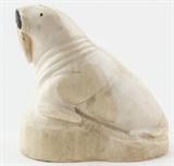 Lot#:	11
Description:	Vintage Ivory / Bone Walrus Sculpture / Figurine
Beautiful, detailed and well crafted Ivory / bone Walrus sculpture / figurine. He is sitting atop a rock and has a stained black snout. Unsigned, it is in excellent condition, no chips, breaks or repairs. Item is being listed as bone (possibly ivory) according to the information provided by the consigner. Measures 2.5" tall x 2.5” long.