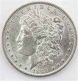 Lot#:	399
Description:	Coin 1894 Morgan Silver Dollar, CH BU
Extremely Rare date 1894 Morgan Silver Dollar in consignor graded CHOICE BU/ Brilliant Uncirculated condition. Philadelphia minted 110,000.
From internet: "The Morgan dollar was a United States dollar coin minted from 1878 to 1904, and then again in 1921. It was the first standard silver dollar minted since production of the previous design, the Seated Liberty dollar, ceased due to the passage of the Coinage Act of 1873, which also ended the free coining of silver. The coin is named for its designer, United States Mint Assistant Engraver George T. Morgan. The obverse depicts a profile portrait representing Liberty, while the reverse depicts an eagle with wings outstretched."
No Sales Tax on Coins, Currency, or Bullion.
Tag Words: Numismatics, Coins, Currency, Money, Collectable, Retirement, Investment, Financial.