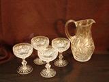 Hand cut crystal pitcher and glasses
