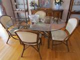 Oval Glass Top Rattan Table w/ 4 Chairs.