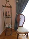 Round 3-Tier Display. Two High Back Wicker Weave Chairs.