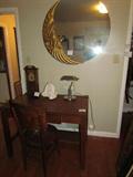 Moon Mirror, round. Tiger Oak Desk & Chair. Old Electic Clock. Banker's Lamp.