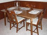 Kitchen Table w/ one leaf and Six Chairs.