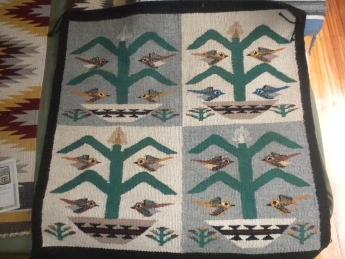 Pretty Navajo wall hanging rugs!