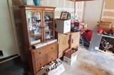 Small maple china hutch $65.00 + Christmas decorations. 