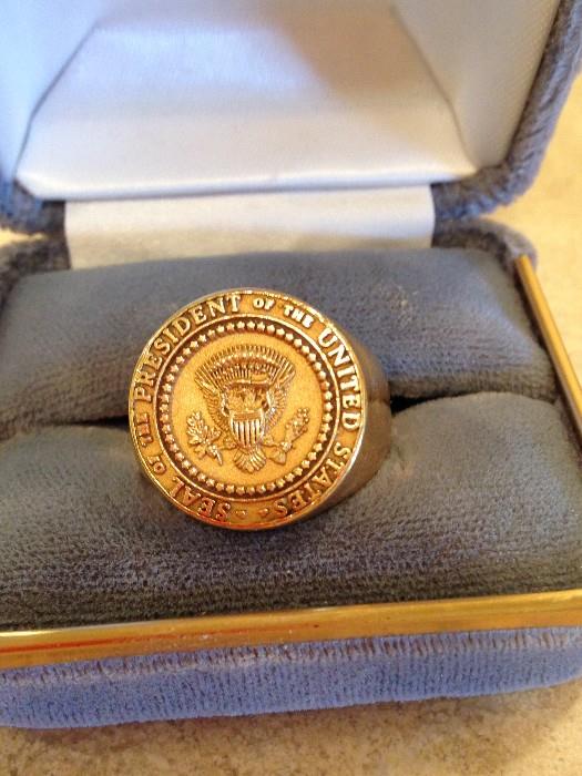 The Tiffany and Co. 18K Gold Presidential Seal Signet Ring Jackie had commissioned for JFK on his 45th Birthday.  Jackie also bestowed a Cartier "Pinkie" ring to him the following year.  When you come to the sale, be sure to ask "why was neither the Tiffany nor Cartier ring stamped"?  The answer will give you an insight into then-Mrs. Kennedy's definition of class.