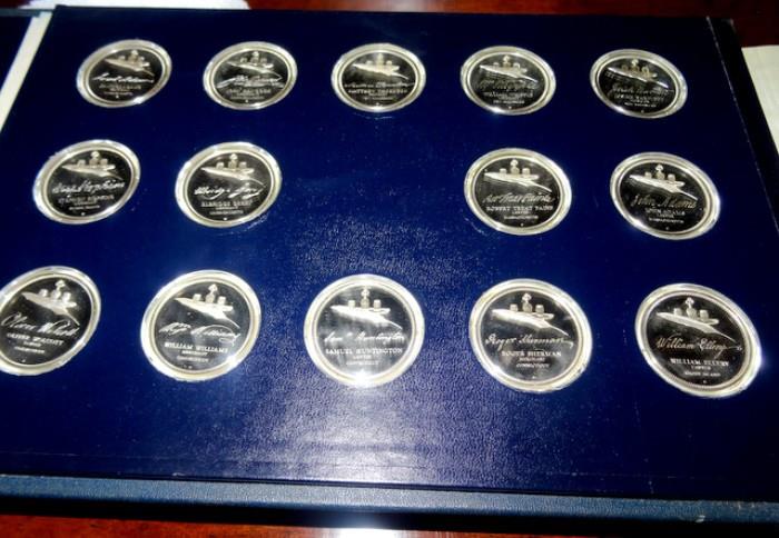 56 piece sterling silver coin set.
Inside is the enscribed:
"In Commemoration of the Signers of the Declaration of Independence
