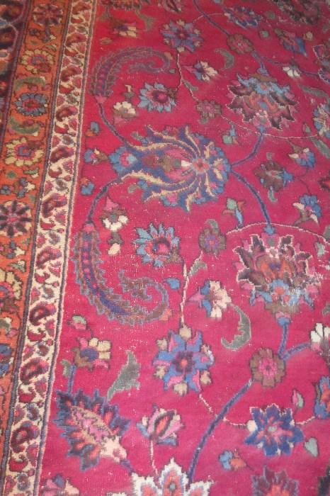 detail of Area Rug, red field with stylized flowers