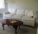 Henredon two-toned fabric couch and loveseat. Coffee table