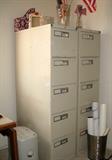 Five drawer letter size file cabinets.