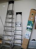 Two ladders-6 foot and 12 foot. Butterfly umbrella in box.