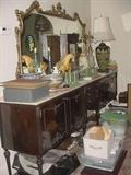 This large buffet was purchased from an old hotel lobby from the 1800's and has a full marble top...packed inside with more collectibles