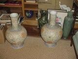 Two of the wonderful Chinese porcelain Urns, plus a jade and other stoneware vases.