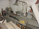 Nice old lathe and all the tools to use it, plus drill press, band saw, and more.
