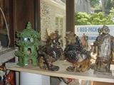 Chineese green porcelain "birdcage" plusCeladon figures, and the soapstone roosters.