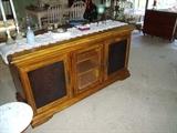 Beautiful credenza with embossed leather doors