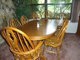 Dining table with 8 chairs, 4 leafs and table pads