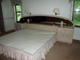 King bedroom set headboard with mirror back and storage.  No mattress - bedsprings only