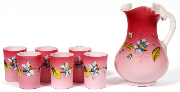 Lot#1008, PEACHBLOW LEMONADE PITCHER & TUMBLERS SET, 19TH C., SEVEN PIECES/Hand blown, enamel decorated, including 1 pitcher, H.10", and 6 tumblers, H.4 1/8".  Brilliantly decorated flowers and leaves.