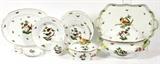 Lot#1014, HEREND 'ROTHSCHILD BIRD' PORCELAIN DINNER SET, 60 PIECES (SERVICE FOR EIGHT)Including 8 service plates, Dia.11", 8 dinner plates, Dia.10 1/2", 8 rim soup bowls, Dia.9 1/2", 8 dessert plates, Dia.8 1/4", 8 saucers, 8 coffee mugs, and 8 napkin rings, as well as 1 oval covered tureen with branch handles, H.10", L.15", 1 oval platter, L.15", 1 round covered vegetable, Dia.18", and 1 rectangular tray with branch handles, L.18".
