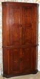 Lot#1051, CHERRY CORNER CUPBOARD, KENTUCKY, C. 1810, H 85", W 40"Cherry cupboard with  maple inlays. Interior having original paint. Cornice, center molding and base in repeating motif. Four panel doors. Original old back boards. Depth 21".