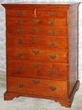 Lot#1052, AMERICAN CHERRY TALL CHEST, C. 1800, H 55", W 39", D 19"Having two short drawers along the top and 6 graduated depth drawers below. Bracket feet. Chestnut is secondary wood. Signed and dated on original old back boards. Dovetail construction.