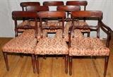 Lot#1057, SHERATON MAHOGANY DINING CHAIRS, EIGHT/Including 1 armchair and 7 side chairs.  Turned and tapered legs, curved back rests with reeded edge, center back brace nicely carved with center shell flanked by leaves.