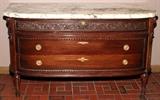 Lot#1060, MAHOGANY MARBLE TOP COMMODE, C. 1910, H 33", W 56", D 24"Very heavy and lovely contoured marble top. Mahogany commode is hand carved. Purchased from a New York estate.