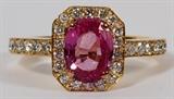 Lot#1072, 1.44CT PINK SAPPHIRE & DIAMOND RING, SIZE 6.75/14kt yellow gold ladies ring, featuring a 1.44 carat oval natural pink sapphire prong set at the center, surrounded by 0.90 carats of round side diamonds. Measuring approximately 4.1 grams in total weight, size 6.75.