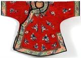 Lot#1142, CHINESE EMBROIDERED RED SILK CHILD'S ROBE, C. 1900/Red silk ground embroidered with scattered blue flowers.  Measures 24 3/4" x 35 1/2" width overall.