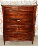 Lot#1157, MAHOGANY BOW-FRONT CHEST, C. 1900, H 43", W 36", D 22"Having four long drawers, two short drawers. Plate glass top.