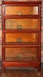 Lot#1166, GLOBE-WERNICKE CO. MAHOGANY FOUR-SECTION BOOKCASE, EARLY 20TH C., H 62", W 34", D 12"Original label.  Size D-Ex Top, Grade 398.