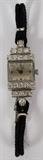 Lot#1200, JACCARD PLATINUM LADY'S WRISTWATCH/Art deco wristwatch with 17 jewel Concord movement, # 334 F platinum case # 1224 set with 20 diamonds and with a elastic band.