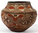 Lot#1279, SOUTHWEST AMERICAN INDIAN POLYCHROME OLLA, H 7", DIA 8 1/2"Decorated in red and black pigments with geometric devices and banding.