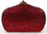 Lot#1363, JUDITH LEIBER RED MINAUDIERE, W 6"Full bead red crystal, cabochon push button opens to silver leather lining, coin purse, mirror, and comb. Stamped: Judith Leiber, New York. Measures W. 6 1/4" x 3 1/2" (20" to the chain shoulder strap).