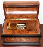 Lot#1450, ITALIAN MUSIC BOX WITH DOMED LID, H 9", W 13", D 9"Nine records.