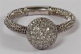 Lot#2090, 0.76CT DIAMOND BALL MESH BAND RING, SIZE 6//18kt white gold mesh band ring, featuring 0.76 carats of round inset diamonds on a center ball form. Measuring approximately 5.9 grams in total weight, size 6.