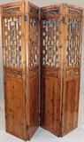 Lot#2205, ANTIQUE CHINESE PINE FOUR-PANEL SCREEN H 102.5" L 92"Each panel is L 23" and is nicely carved with urn, floral and sword forms.