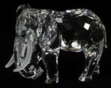 Lot#215, SWAROVSKI CUT CRYSTAL, H 3 1/2", L 5" "INSPIRATION AFRICA", "ELEPHANT"having dark stone eyes and frosted tusks.