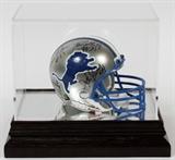 Lot#288, DETROIT LIONS AUTOGRAPHED MINI-HELMET, GREG LANDRY, WILLIAM GAY, DEXTER BUSSEY, ETC. C1990, H 8"includes autographs of Greg Landry, William Gay, Horace King, Luther Blue, Ken Callicutt, Dexter Bussey, Bob Kowalkowski, Robert Porcher, etc. mounted in a clear plastic case with black plastic base.